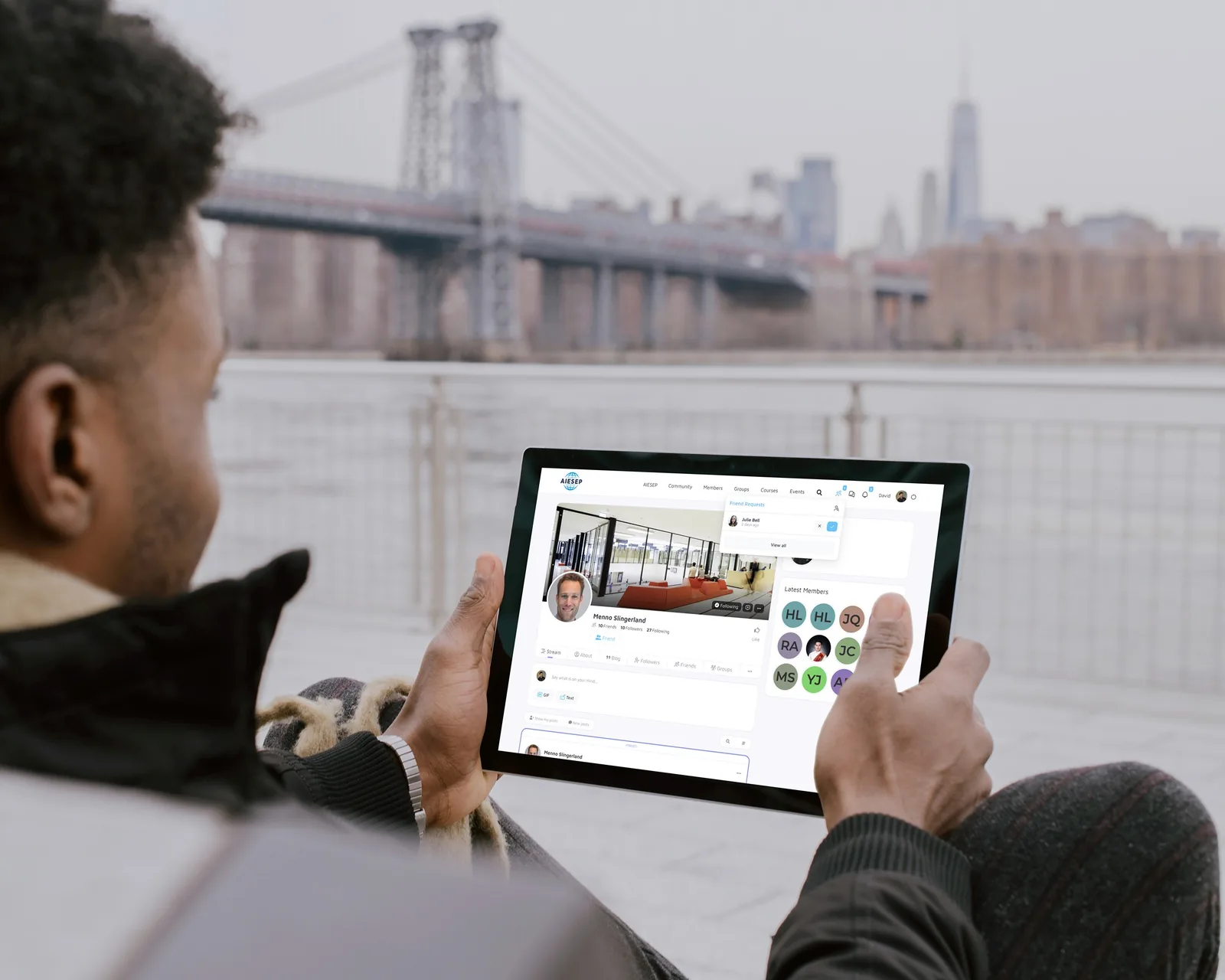 AIESEP international community platform being used on a tablet