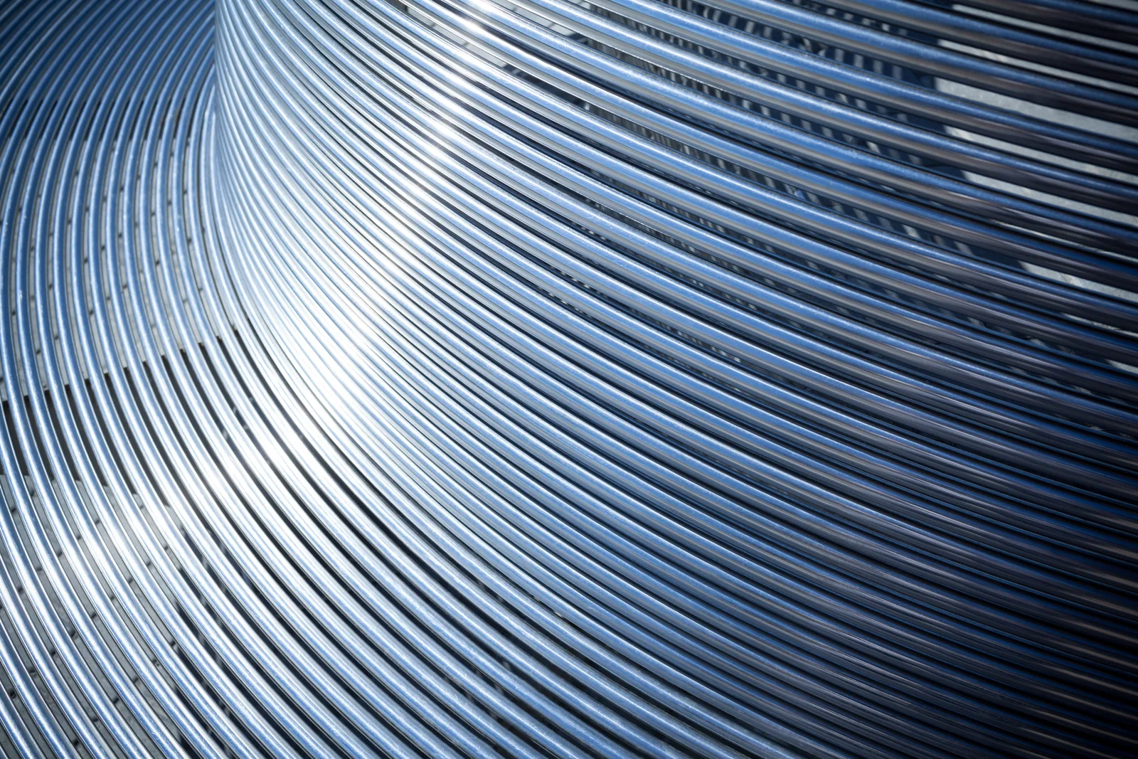 Curved metallic lines for modern website design aesthetics.