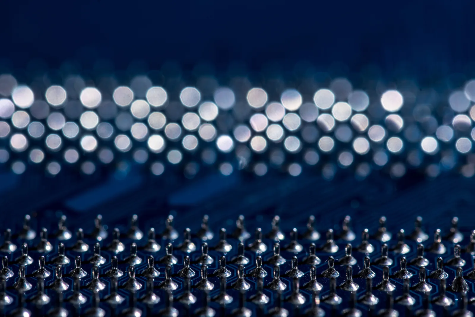 Close-up of circuit board pins for precise web development Ireland.