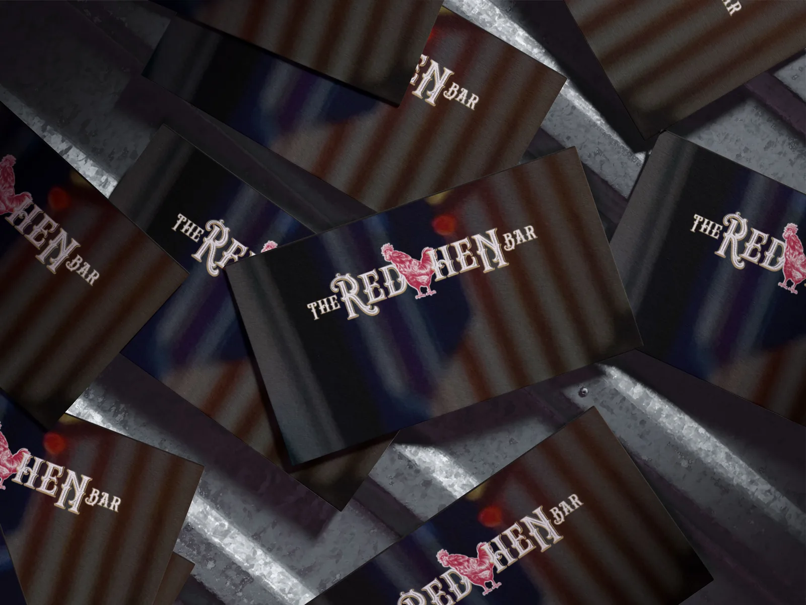 The Red Hen Bar brand identity design on business cards.